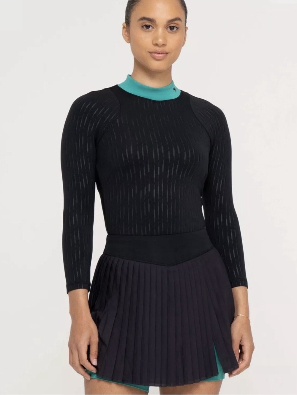 Bad Birdie golf top  Black Long Sleeve Performance Top with Teal Mock Neck